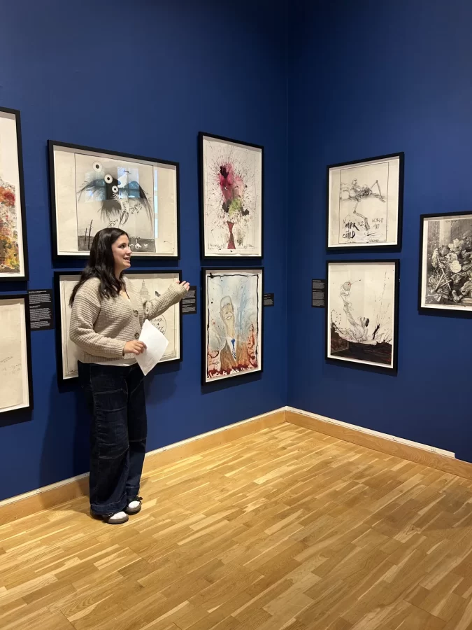 Intern Lucy Read '27 speaking in the gallery
