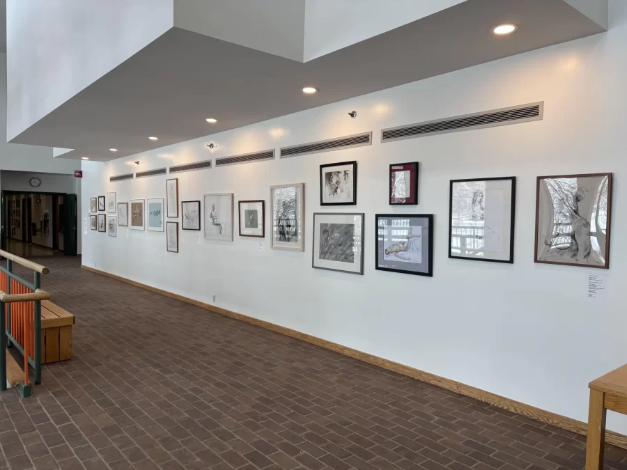 View of life drawing exhibition mounted on Olin Lobby walls
