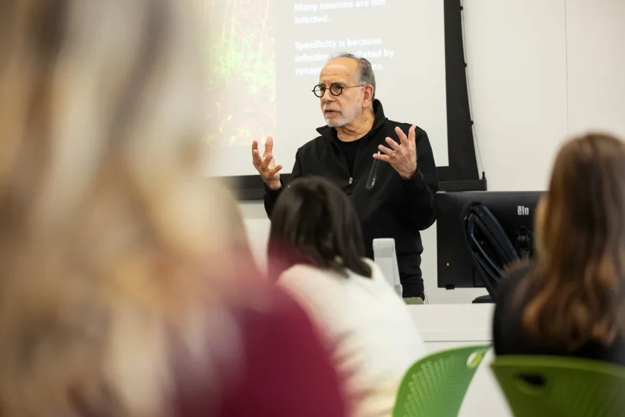 Peter Strick P’98, Thomas Detre Professor and Chair of Neurobiology at the University of Pittsburgh, gives a seminar in Bonney Science Center, the inaugural installation of the Program in Neuroscience’s new seminar series. (Theophil Syslo/Bates College)