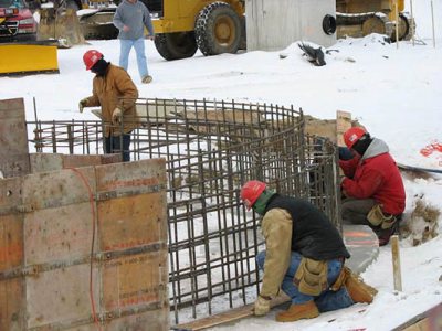 Hey baba rebar: On Jan. 16, workers prepared forms and rebar for the final section of the new dining Commons' concrete frost wall. The fireplace lounge will be situated here.