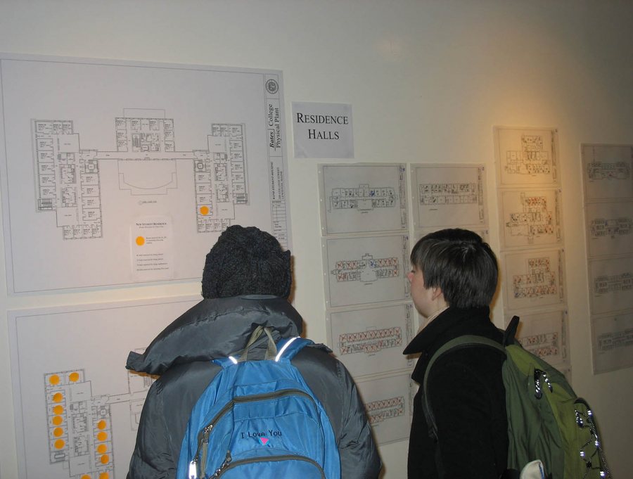 How suite it is: Students examine floor plans for the new student housing. (Doug Hubley/Bates College)