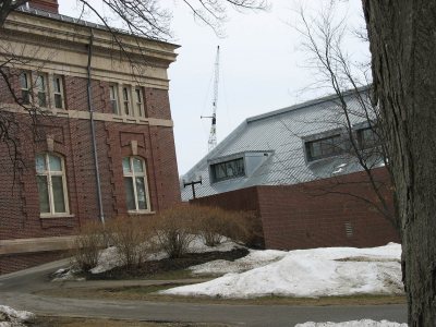 The Link-Belt crane, seen between Coram and Ladd, has loomed over campus for weeks. (Doug Hubley/Bates College)