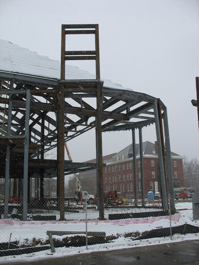 Commons' fireplace lounge, with a tall steel structure that will enclose the fireplace exhaust stack. (Doug Hubley/Bates College)