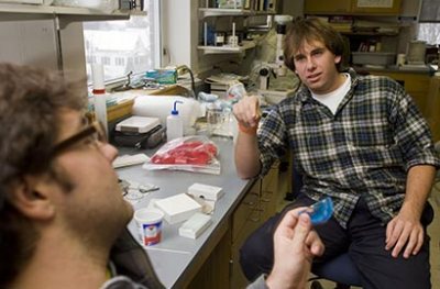 Gregory Henkes '08 (with glasses) and Ben Levin '09 in two labs that allow them to work with Professor of Biology William Ambrose on clam research.

Greg Henkes '08 displays vials used to isolate and identify specific amino acids from the shells of Serripes groenlandicus. In typical cooperative spirit, Henkes and biologist Will Ambrose rely on geologist Bev Johnson's expertise in this area as they investigate whether amino acids are a proxy for changing food sources in the Artic.