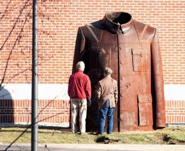 The Committee on Public Art announces the arrival of Sui Jianguoâs
Sculpture Legacy Mantle (Mao Jacket) on the Bates Walk.  The work 
is on loan for one year.

Sui Jianguo is considered one of the premier sculptures in China today and his work has been displayed in the pivotal international exhibitions of Chinese art in the past twenty years.  These exhibitions include âMade in China,â âArt and Chinaâs Revolution,â "New Art from China: post-89," âChina Tradeâ and  âBeautiful Cynicism.â 

His series of Mao suits are considered icons of contemporary Chinese art. 
The iconic Mao jacket, emptied of its signature occupant, appears in a monumental scale draped in irony.  The 4-ton metal jacket is 3 meters high, 2.5 meters wide, and 1.5 meters deep.

Sui Jianguo received his MFA from the Central Academy of Fine Arts in Beijing. His studio is based in Beijing and he is a Professor and the Chair of the Central Academy Sculpture Department.

Frank Toth of JC Super & Sons in Harrison, NJ, drove the Mao jacket up to Bates.

Leo Castonguay, working on hooking up statue, and Jerry Castonguay, at wheel of the crane, manage moving the scultpture into place.