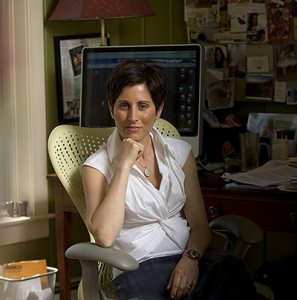 Lisa Genova '92, author of "Still Alice," a novel about a women with Alzheimer's, has a Harvard Ph.D. in neuroscience. She is posing at her home in Chatham, Mass., at 121 Countryside Drive.