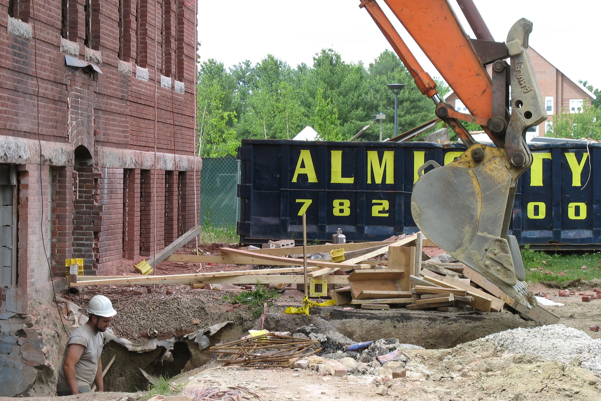 Dug to give heavy machinery access to the Roger Bill basement, this trench marks the spot where a large section of building wall will be removed to make way for an addition. (Doug Huibley/Bates College)