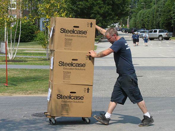 Mover pushes furniture toward Hedge Hall
