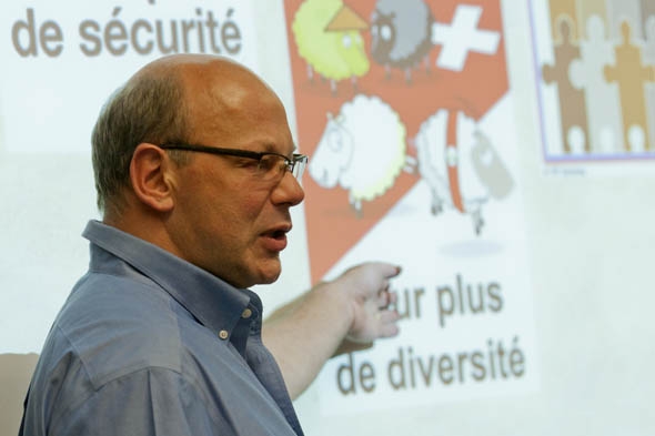 French professor Alex Dauge-Roth gestures during the faculty conversation about global citizenship held prior to the dedication of Hedge and Roger Williams halls. Photograph by Phyllis Graber Jensen.