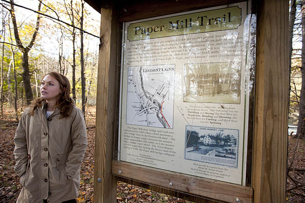 Georgia Doucette '12 during a visit to a finished portion of the municipal trail system in Lisbon, Maine.