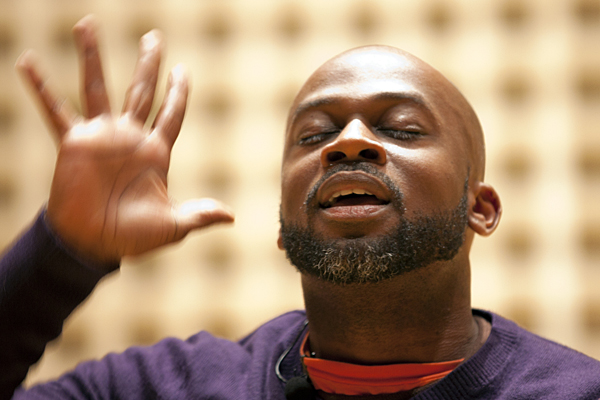 Shown performing at Bates in January, Marc Bamuthi Joseph brings his dance and spoken-word piece "red, black & GREEN: a blues" to Bates in April. Photograph by Phyllis Graber Jensen/Bates College.