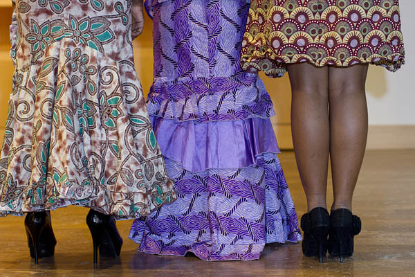 Modeling Nigerian dresses for the Inside Africa Fashion Show are sophomores Folarera Fasawe, Michelle Pham and Nicole Kanu.