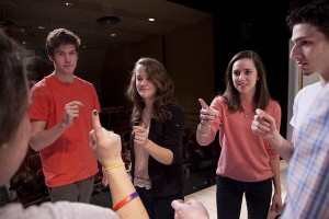 Right to left: Daniel Waters '12, director Elizabeth Castellano '12, Hanna Allerton '15, Charles McKitrick '14 and Caitlyn Defiore '12 (back to camera) rehearse for "A Doll's House."