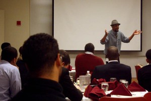 Ozzie Jones '92 offers advice at a Bates-hosted conference for black and Latino male students. Photograph by Simone Schriger '14.