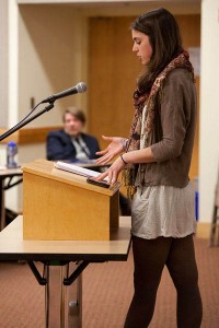 With poet and writing adviser Rob Farnsworth looking on, Karen Nicoletti '12 reads from her novel during the 2012 Mount David Summit. Photograph by Rene Minnis.