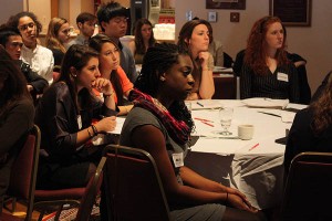 Participants listen during a presentation by the Bates Creative Mafia on March 31, 2012.