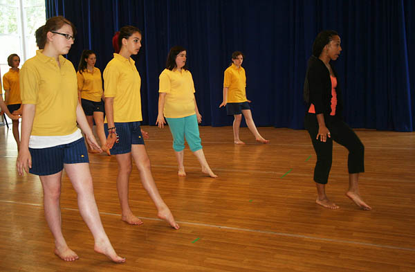 Victoria Lowe '12, at right, leads a dance class during her 2012 internship at the Tacchi-Morris Arts Centre in Taunton, U.K.