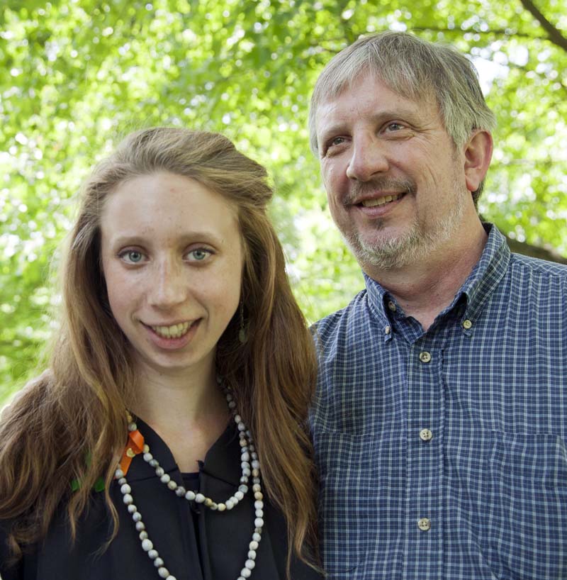 Robert Long '79 poses with his daughter Erica Long '12 on Commencement morning. Photograph by Phyllis Graber Jensen / Bates College.