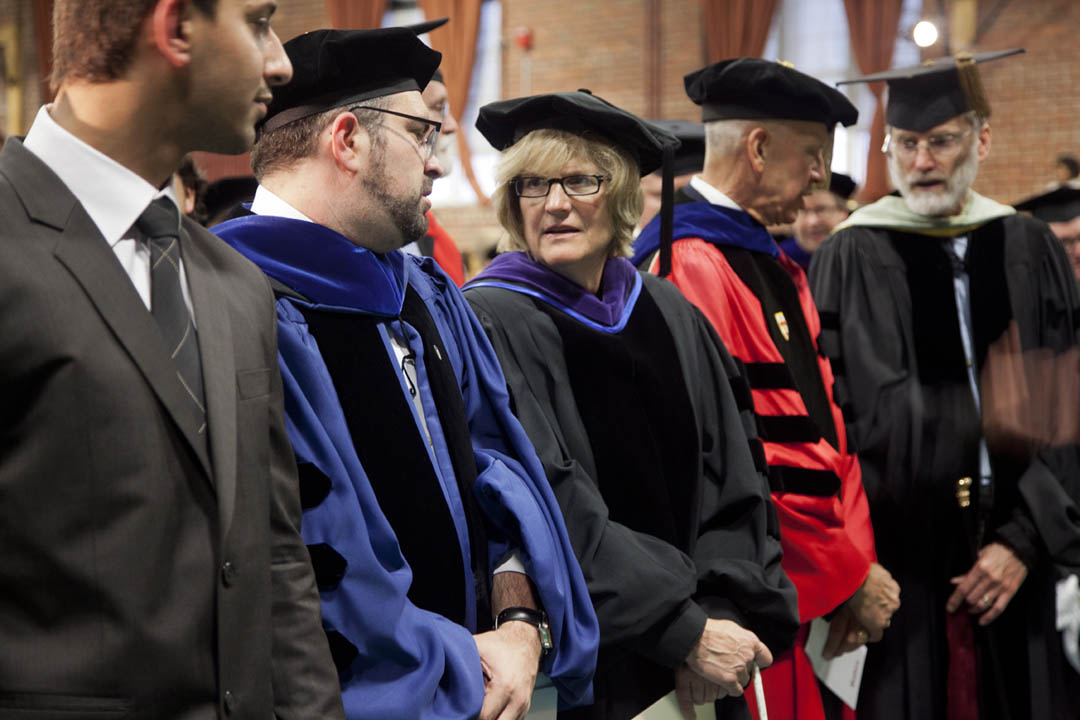 From left, Convocation speakers Umar Khan '13, professor Stephen Engel and Bates President Clayton Spencer chat prior to Convocation 2012. Also shown are professors Sawyer Sylvester and Thomas Tracy. Photograph by Phyllis Graber Jensen/Bates College.