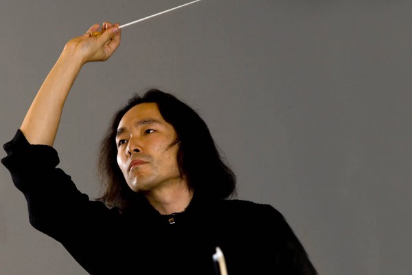 Hiroya Miura conducts the Bates College Orchestra. Photograph: Phyllis Graber Jensen/Bates College.