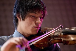 Hiraku Asao '16 performs with the Bates Jazz Combo during the 2013 Arts Crawl. (Phyllis Graber Jensen/Bates College)