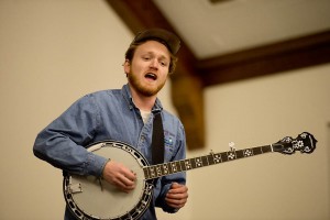 Grady Hogan '13 performed in Memorial Commons with Lena and Los Morose Bros. Photograph by Michael Brady/Bates College.