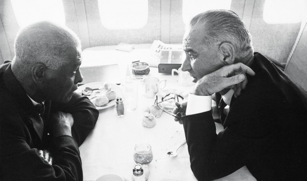 In June 1963, Mays and then-Vice President Lyndon Johnson confer while en route to the state funeral of Pope John XIII.  Yoichi Okamoto/LBJ Presidential Library