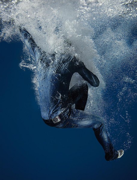 A model goes underwater in ecofriendly denim manufactured without water, for Agence Antidote, Paris. Photograph by Ryan Heffernan '05