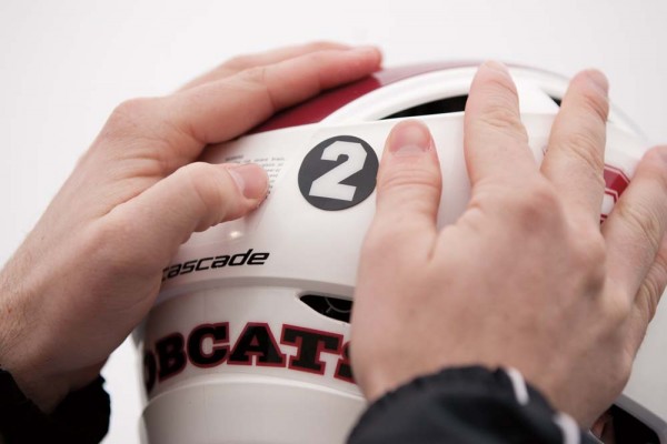 Players, coaches and fans wore No. 2 decals honoring McDuffee’s uniform number at Bates. Photograph by Phyllis Graber Jensen/Bates College.