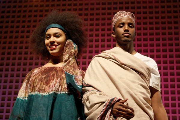 At Bates College's 2012 Inside Africa Fashion Show, sophomore Nerissa Brobbey models a Togolese boubou dress with matching head scarf. At right, Gulaid Abdullahi wears a traditional ma'awis and kofia hat. Photograph by Simone Schriger '14/Bates College.