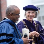 Elaine Hansen laughs with Marcus Bruce ’77, the Benjamin Mays Professor of Religious Studies, prior to Convocation 2010. Photograph by Phyllis Graber Jensen/Bates College.