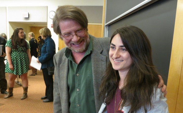 Senior Lecturer in English Robert Farnsworth congratulates Ashley Lepre '13 after the annual creative writing thesis reading at Mount David Summit on March 29, 2013. Photographs by Jay Burns.