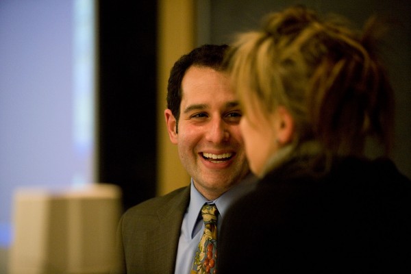 Jonathan Adler '00, seen here talking with Kati Vecsey of the theater department during his lecture at Bates in 2008.