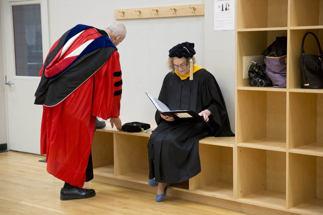 Professor of Sociology Sawyer Sylvester (left) and retiring Dean of the Faculty Pam Baker '69 just prior to Commencement. Photograph by Phyllis Graber Jensen/Bates College.