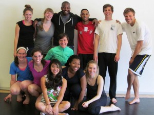 Postell Pringle '98, center rear, and his classmate Erin Gottwald (in green) led these students in creating a piece for the 2013 Tour, Teach, Perform unit.