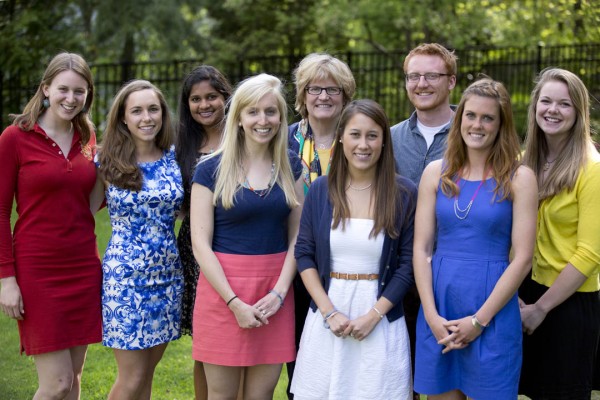 With the exception of Hakimah Abdul-Fattah and Cameron Sheldon, who were abroad, the 2013 Fulbright grant recipients attended a May 13 reception at the home of Bates President Clayton Spencer. From left: Catherine Tuttle, Libby Egan, Tara Prasad, Marisa Mohrer, Spencer, Valerie Jarvis, Hansen Johnson, Nora Hanagan, Taryn O'Connell. Photograph by Phyllis Graber Jensen/Bates College.