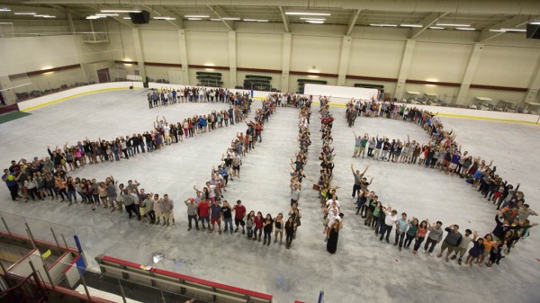 The members of the Bates Class of 2013 gathered in Underhill Arena on Friday, May 24 for their class photo. Photo by Mike Bradley/Bates College.