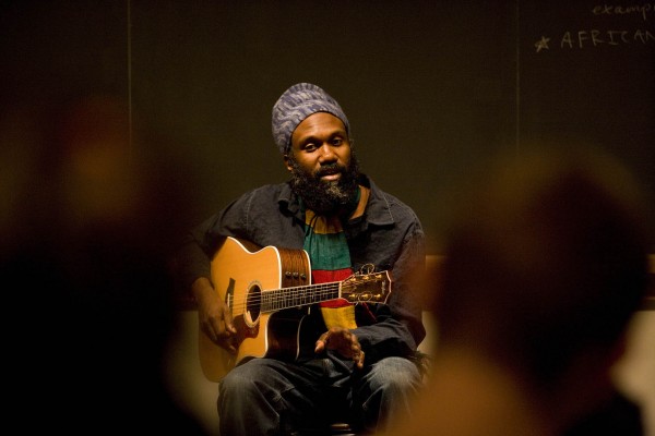 Corey Harris performs in 2008 at Bates College, where he is a member of the class of 1991. Photograph by Phyllis Graber Jensen/Bates College.