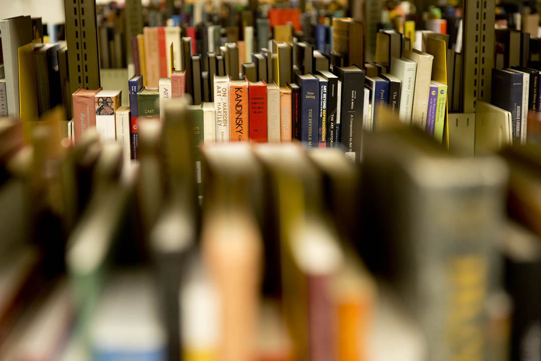 Digital age notwithstanding, the George and Helen Ladd Library has 600,000 catalogued volumes, including these books about fine arts. (Phyllis Graber Jensen/Bates College)