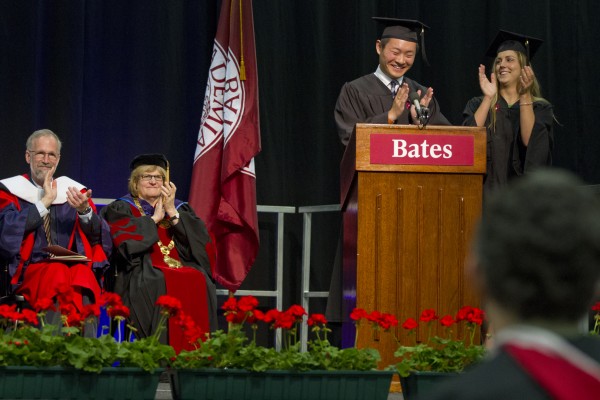 XX and XX present the Senior Class Gift to President Clayton Spencer at Bates' XXXth Commencement. With 92 percent participation, the Class of 2013 beat the previous participation record held by their immediate predecessors, the Class of 2012.