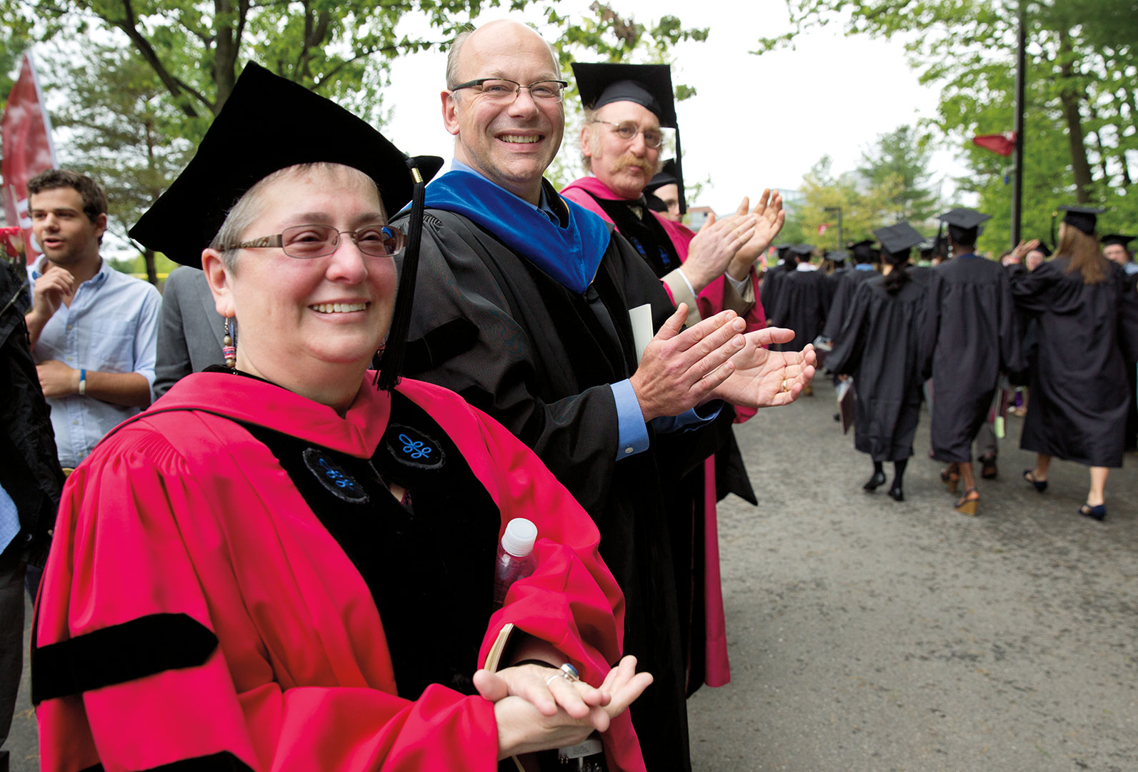 Professors Elizabeth Eames, Alex Dauge-Roth and Sanford Freedman await the graduates outside. Photograph by Phyllis Graber Jensen