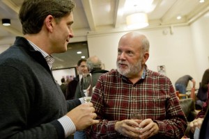 Darrell Crate ’89, a member of the Board of Trustees, talks with Michael Murray, the college’s Charles Franklin Phillips Professor of Economics. (Phyllis Graber Jensen/Bates College)