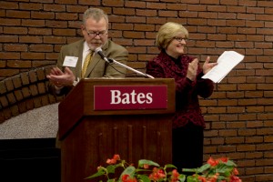 Chair of the Board of Trustees Michael Bonney '80 announces the $11.5 million Catalyst Fund gift as Bates President Clayton Spencer applauds. (Sarah Crosby/Bates College) 