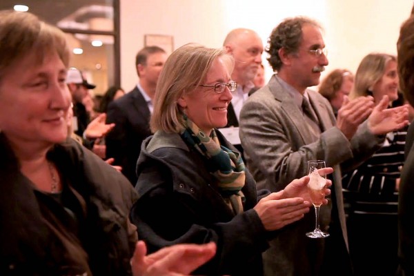 Faculty members Lillian Nayder (English), Jane Costlow (environmental studies) and Tom Wenzel (chemistry) applaud the announcement of the Catalyst Fund gift. (Phyllis Graber Jensen/Bates College)