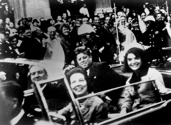 President John Kennedy and Jacqueline Kennedy ride with Texas Gov. John Connally and Nellie Connally in the presidential motorcade on Nov. 22, 1963. (Victor Hugo King / Library of Congress Prints and Photographs Division)