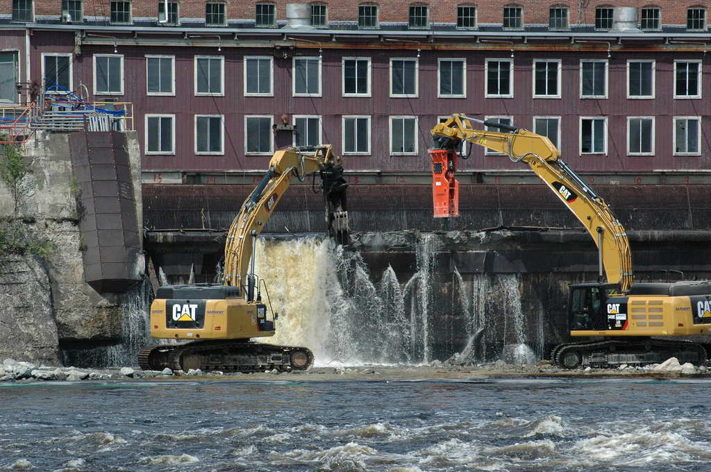 The breaching of the Veazie Dam on the Penobscot River in July 2013. Photograph copyright © 2013 by the Penobscot Trust.