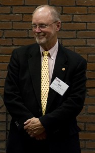 Bill Hiss '66, P'15, P'16 receives receives his citation and award at the Nov. 2 reception. (Sarah Crosby/Bates College)