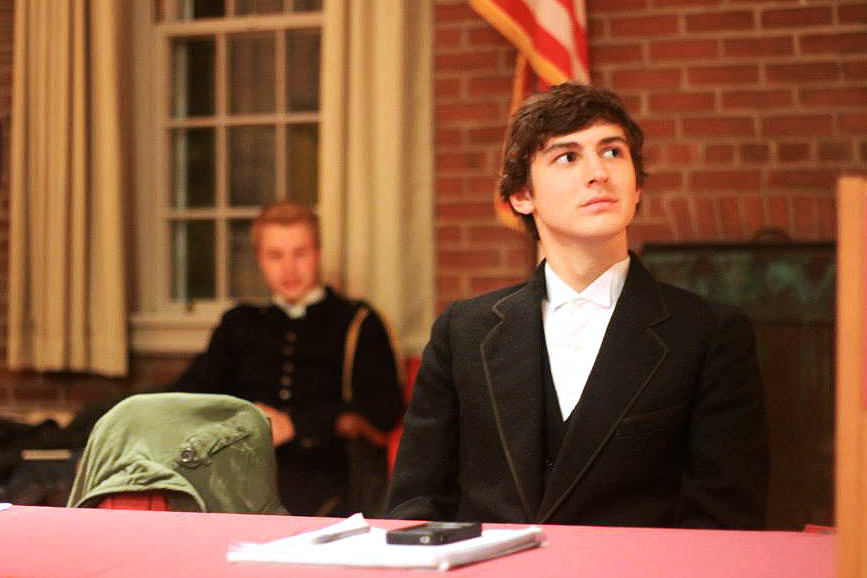 Dmitriy Redkin ’17 plays Thomas Jefferson during a Halloween-week debate in which Brooks Quimby Debate members debated as Revolutionary War characters. 