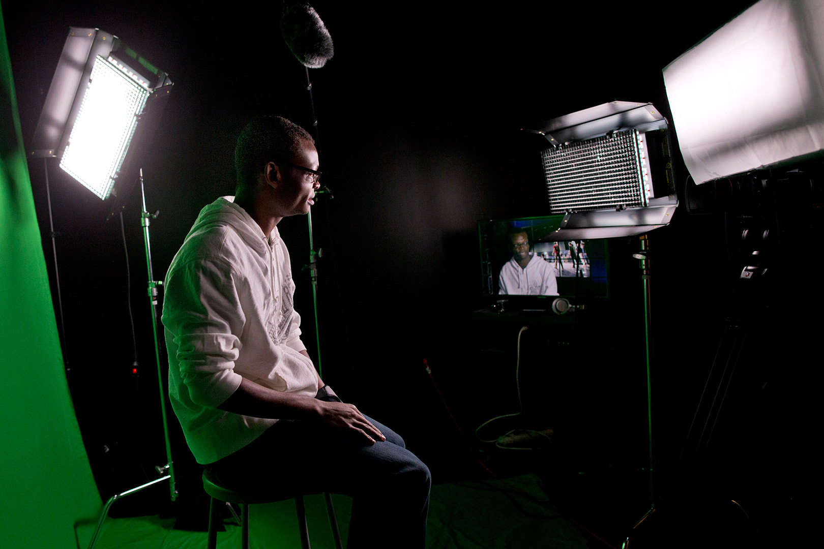 Videographer Joshua Ajamu '14 of Breinigsville, Pa., has found a second home in Pettigrew's new Digital Media Studios. (Phyllis Graber Jensne/Bates College)