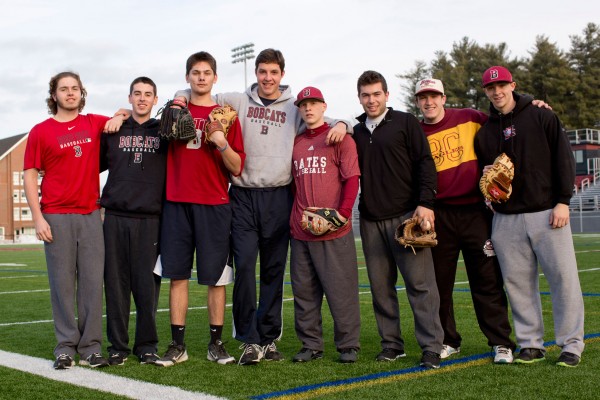 Bates ballplayers pause during an informal practice on Garcelon Field. (Phyllis Graber Jensen/Bates College)